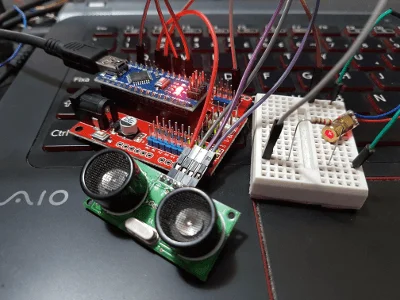 Como acionar laser por sensor ultrassônico