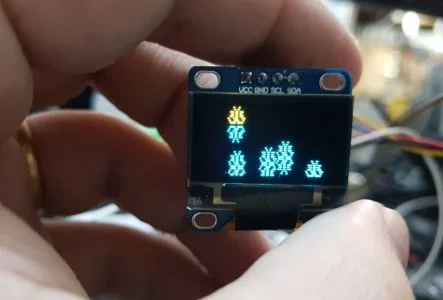 Tema de natal com ESP32, buzzer e OLED